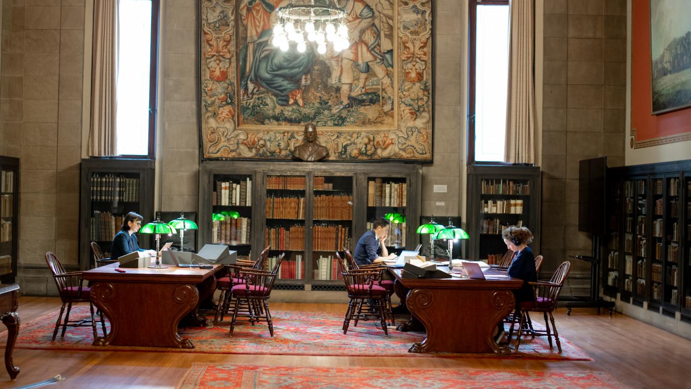 researchers work in the library's reading room