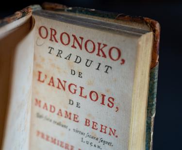 Detail of title page shows red and black printed text reading "Oronoko, traduit de l'anglois, de Madame Behn."