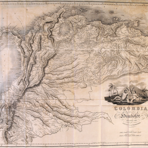 Printed fold-out map shows topography of Colombia in great detail. Includes decorative cartouche, illustration of two naked people sitting facing each other, and scales.