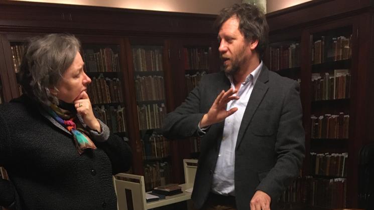 man and woman talking