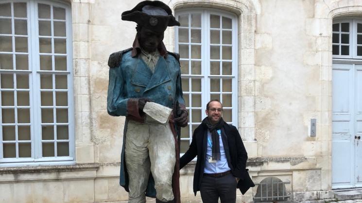 John Carter brown library director Neil Safier next to statue of toussaint louverture