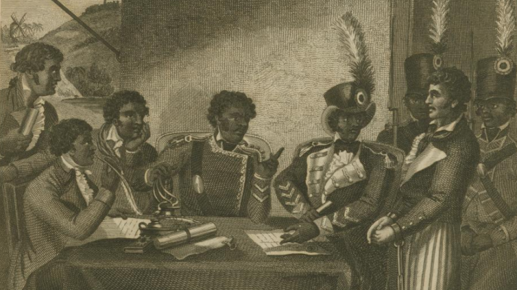 A group of men dressed in military uniform sit around a table, surrounded by soldiers carrying muskets who stand behind a white prisoner. One man is writing on a piece of parchment on the table.  