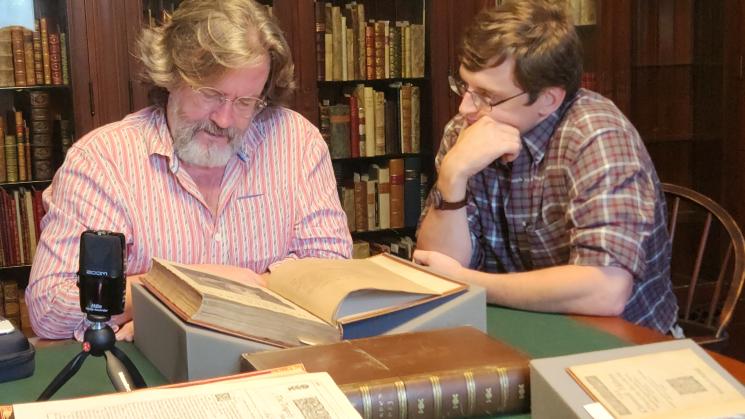 Gregory Doran and Mark Armstrong examine several pieces during Doran's visit to the JCB.