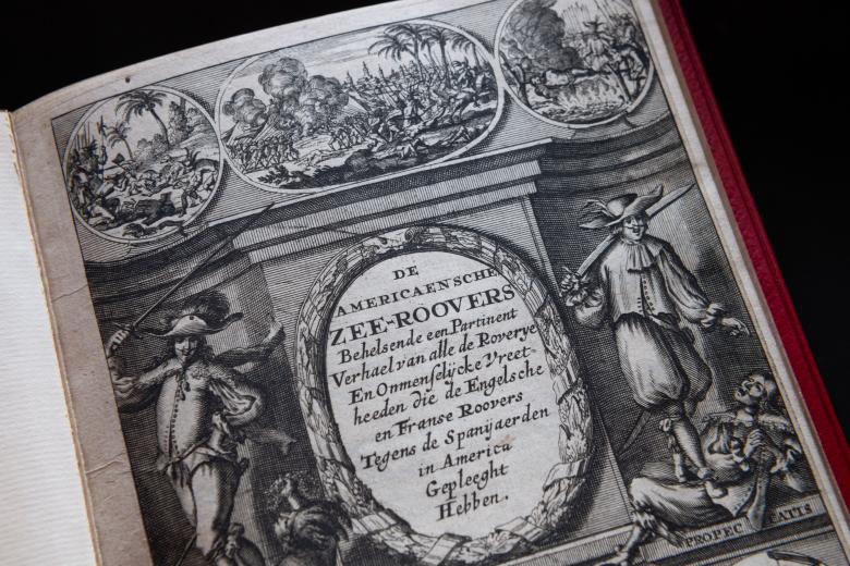 Detail from a printed book shows an engraved title page and text in Dutch.