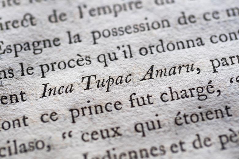 Detail of a printed book shows text in French.