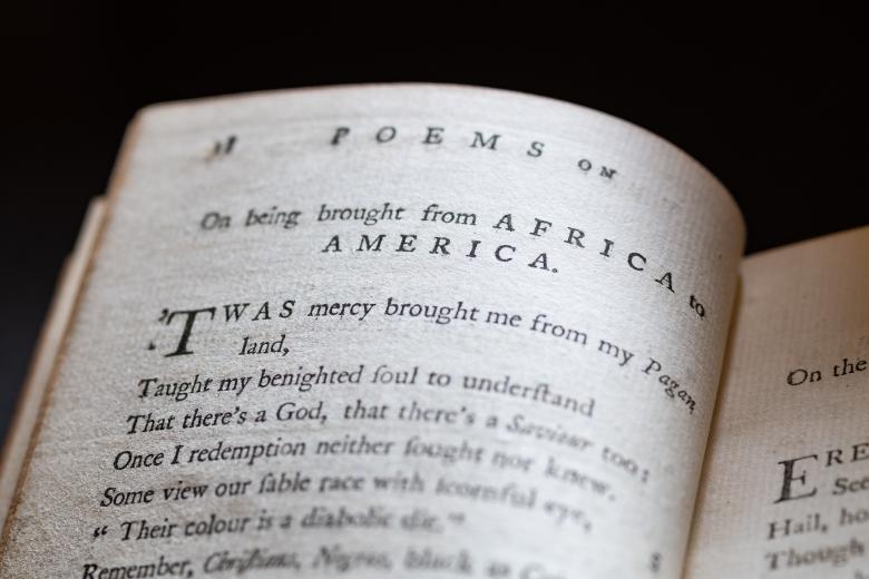 Detail of a printed text shows text in English reading "On being brought from Africa to America."