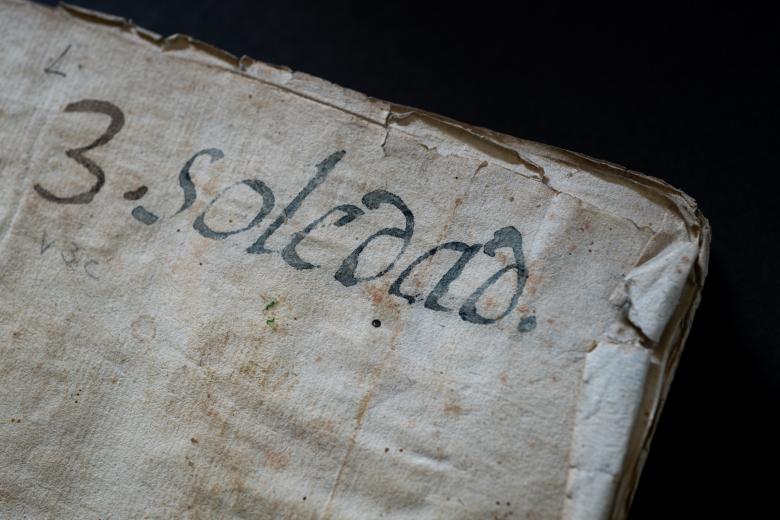 Detail from the binding of a manuscript codex shows text in Spanish "3. Soledad."