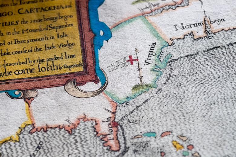 Detail of a colored, engraved map shows "Florida," "Virginia," and partial view of frontispiece with text in English.