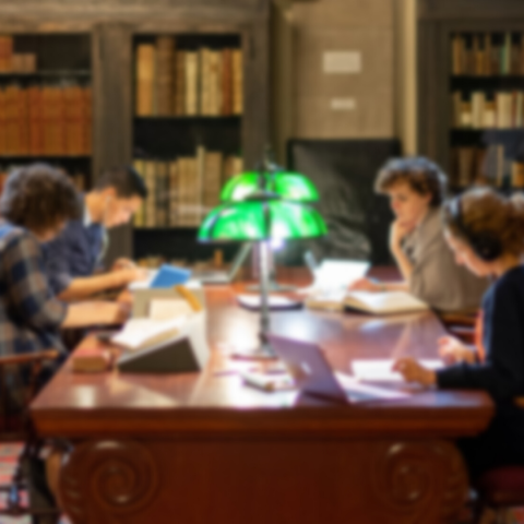 A photo of fellows in the reading room